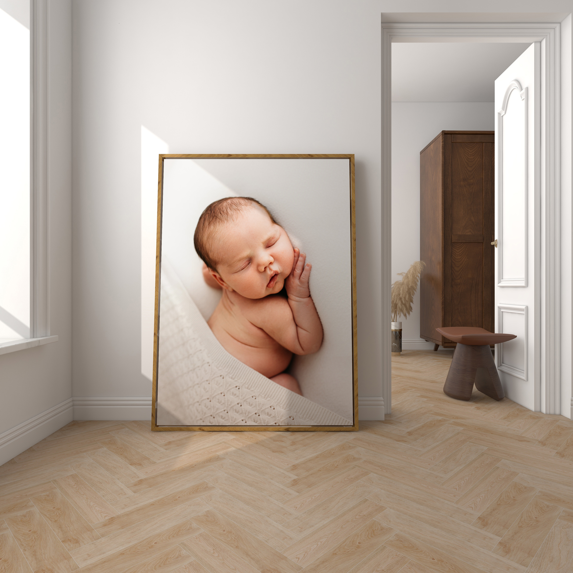 A photo frame with baby boy by Wirral newborn photographer.